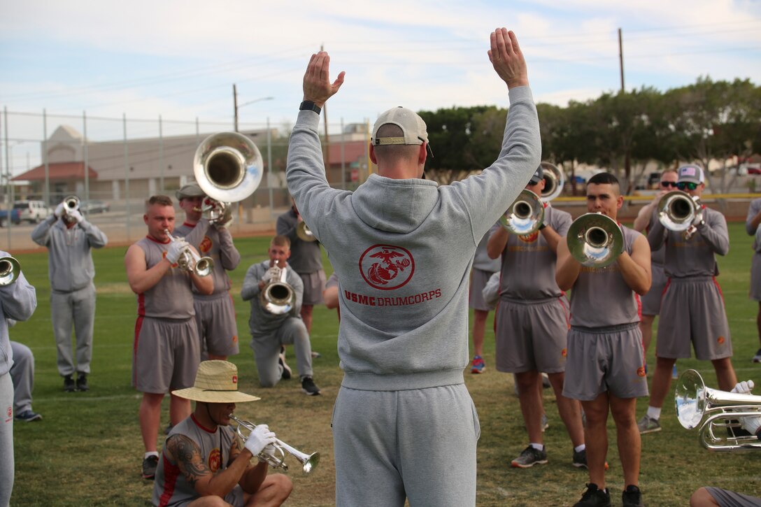 Marines with “The Commandant’s Own,” U.S. Marine Drum & Bugle Corps, practice their drill sequences during the annual Battle Color Detachment training evolution at Marine Corps Air Station Yuma, Az., Feb. 16, 2018. The BCD consists of the Silent Drill Platoon, “The Commandant’s Own,” the United States Marine Drum & Bugle Corps and the Marine Corps Color Guard. The BCD conducts this training in order to refine and reform drill movements and performances for this upcoming West Coast Tour and 2018 parade season. (Official Marine Corps photo by Cpl. Damon A. Mclean/Released)