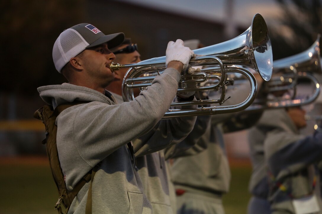 Marines with “The Commandant’s Own,” U.S. Marine Drum & Bugle Corps, practice their drill sequences during the annual Battle Color Detachment training evolution at Marine Corps Air Station Yuma, Az., Feb. 21, 2018. The BCD consists of the Silent Drill Platoon, “The Commandant’s Own,” the United States Marine Drum & Bugle Corps and the Marine Corps Color Guard. The BCD conducts this training in order to refine and reform drill movements and performances for this upcoming West Coast Tour and 2018 parade season. (Official Marine Corps photo by Cpl. Damon Mclean/Released)