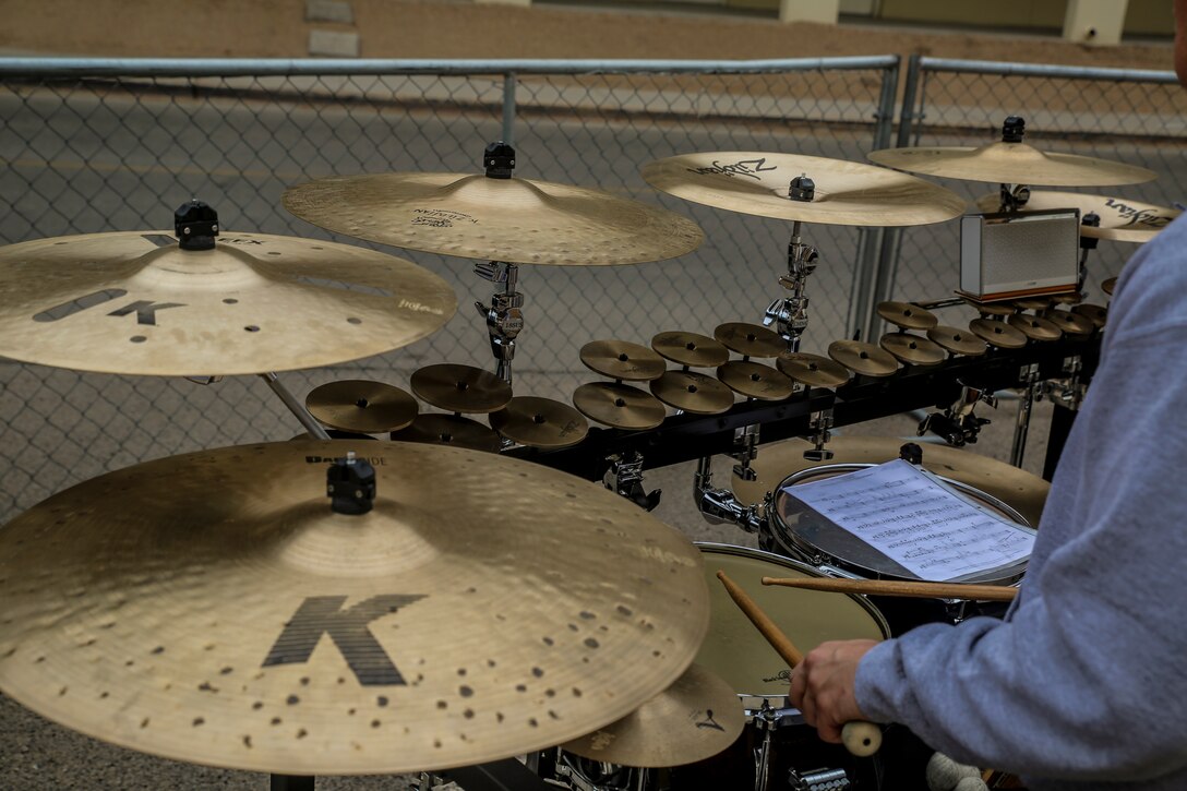 A front ensemble Marine with “The Commandant’s Own,” U.S. Marine Drum & Bugle Corps, practices from his sheet music during the annual Battle Color Detachment training evolution at Marine Corps Air Station Yuma, Az., Feb. 14, 2018. The BCD consists of the Silent Drill Platoon, “The Commandant’s Own,” the United States Marine Drum & Bugle Corps and the Marine Corps Color Guard. The BCD conducts this training in order to refine and reform drill movements and performances for this upcoming West Coast Tour and 2018 parade season.(Official Marine Corps photo by Cpl. Damon A. Mclean/Released)