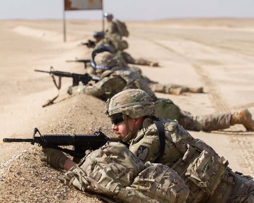 Staff Sgt. Dale Sorensen and other Soldiers of Delta Battery, 1st Battalion, 145th Field Artillery Regiment, pull security at a landing zone in anticipation of a UH-60 Black Hawk helicopter at Camp Buehring, Kuwait, Feb. 28, 2018.