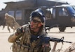 Sergeant 1st Class Aaron Sanford, a maintenance supervisor, Delta Battery, 1st Battalion, 145th Field Artillery Regiment, gives commands to his platoon following their departure from a UH-60 Black Hawk near Camp Buehring, Kuwait, Feb. 28, 2018.