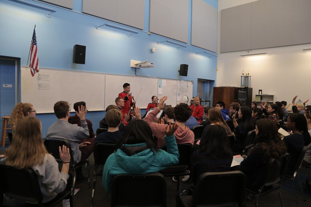 On March 5, 2018 a string quartet from "The President's Own" U.S. Marine Band performed a Music in the High Schools program at Yorktown High School in Arlington, Va. (U.S. Marine Corps photo by Master Sgt. Kristin duBois/released)