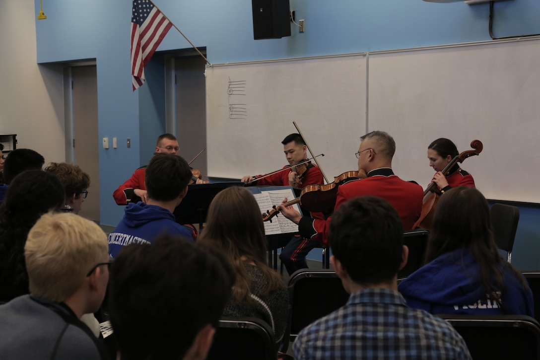 On March 5, 2018 a string quartet from "The President's Own" U.S. Marine Band performed a Music in the High Schools program at Yorktown High School in Arlington, Va. (U.S. Marine Corps photo by Master Sgt. Kristin duBois/released)