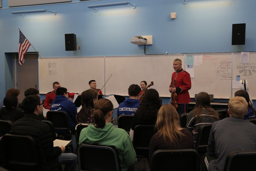On March 5, 2018 a string quartet from "The President's Own" U.S. Marine Band performed a Music in the High Schools program at Yorktown High School in Arlington, Va. (U.S. Marine Corps photo by Master Sgt. Kristin duBois/released)