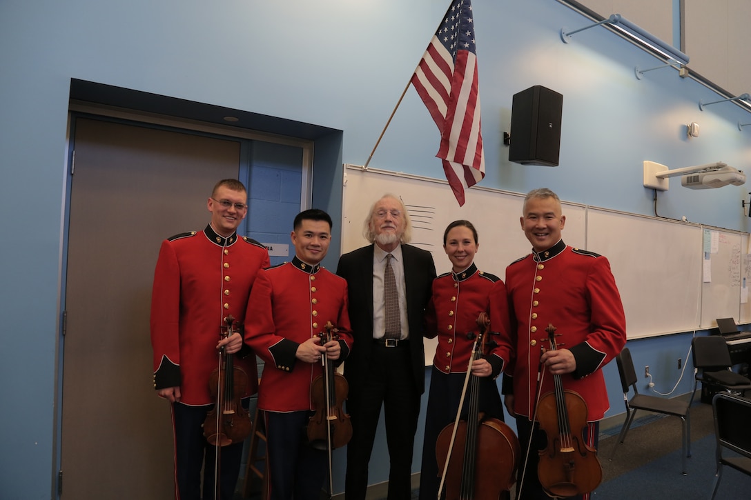 On March 5, 2018 a string quartet from "The President's Own" U.S. Marine Band performed a Music in the High Schools program at Yorktown High School in Arlington, Va. (U.S. Marine Corps photo by Master Sgt. Kristin duBois/released)