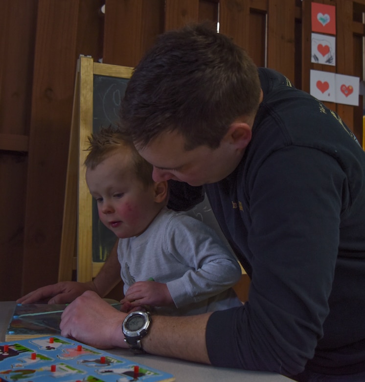 Father and son at play together.