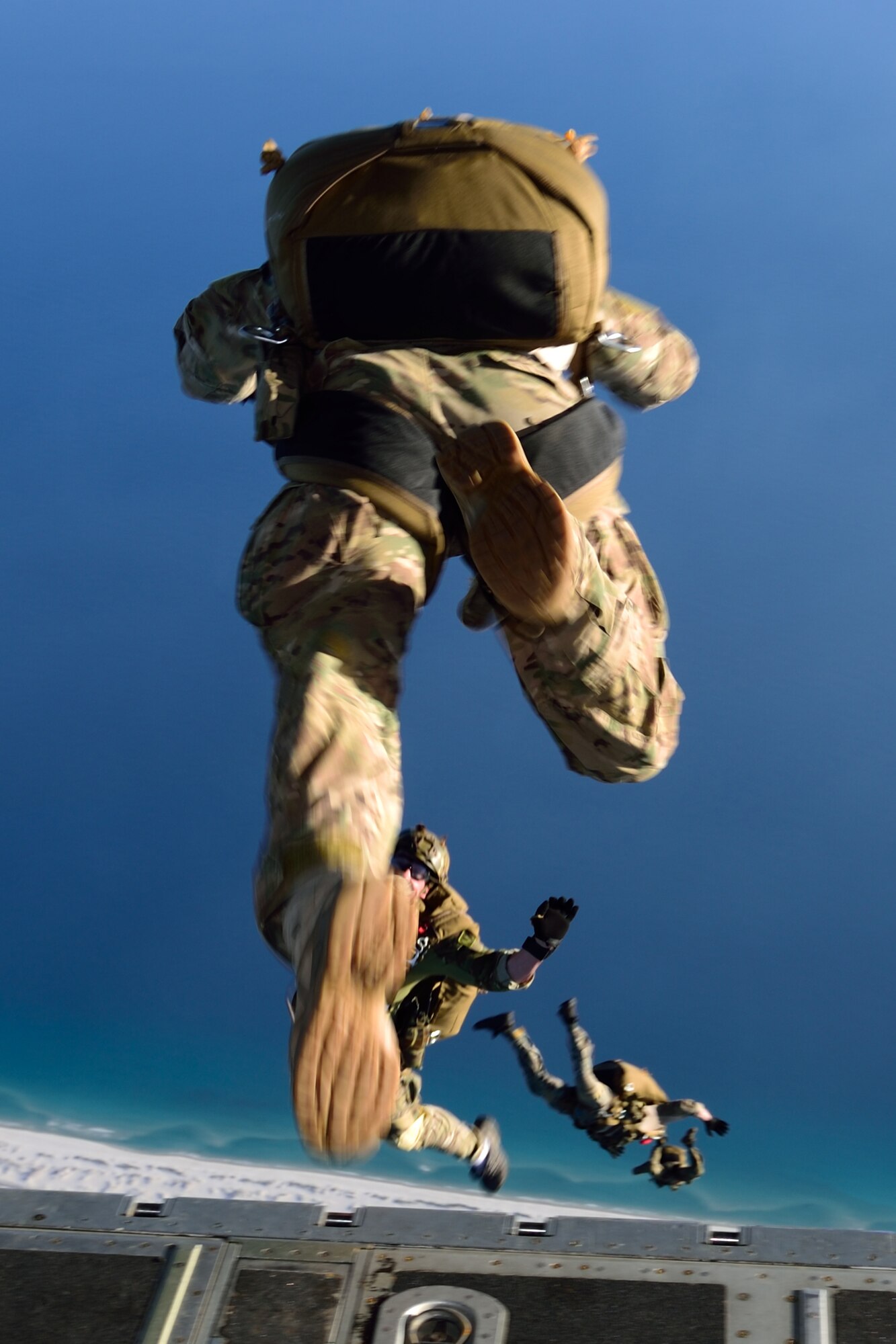 Special Forces members jump out the back of a C-130J Super Hercules aircraft March 2 during Emerald Warrior 2018. The 815th AS “Flying Jennies” from Keesler Air Force Base, Mississippi, provided airlift support for Emerald Warrior 2018, a special operations joint training event involving various units from all U.S. military branches, the U.S. Special Operations Command and North Atlantic Treaty Organization partner forces from Feb. 26 to March 9. (U.S. Air Force photo by Tech. Sgt. Ryan Labadens)