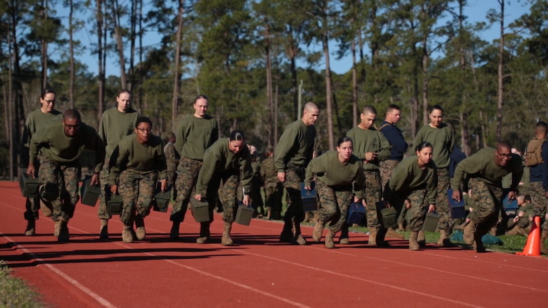 The new Marines of Mike Company, 3rd Recruit Training Battalion, and Papa Company, 4th Recruit Training Battalion, run during a relay race during a field meet March 3, 2018, on Parris Island, S.C.
