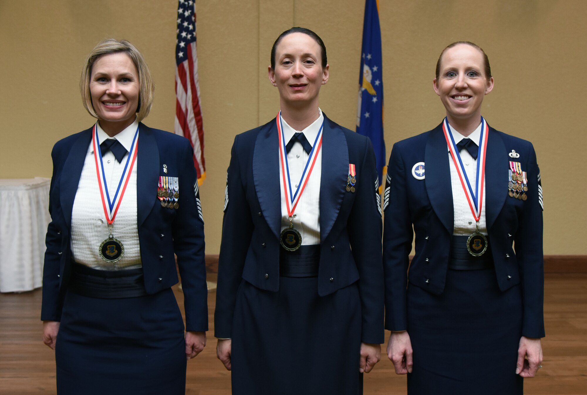 Keesler’s newest chief master sergeants, Chief Master Sgt. Jacey McDuffie, 81st Diagnostic and Therapeutics Squadron pharmacy flight lead; Chief Master Sgt. Jolynn Kari, 81st Medical Support Squadron functional manager, and Senior Master Sgt. Jessika Dowdy, 334th Training Squadron command and control training flight superintendent, pose for a photo during the Chief Induction Ceremony at the Bay Breeze Event Center March 1, 2018, on Keesler Air Force Base, Mississippi. Three Keesler Airmen earned their chief master sergeant stripe during the 2018 promotion release. (U.S. Air Force photo by Kemberly Groue)