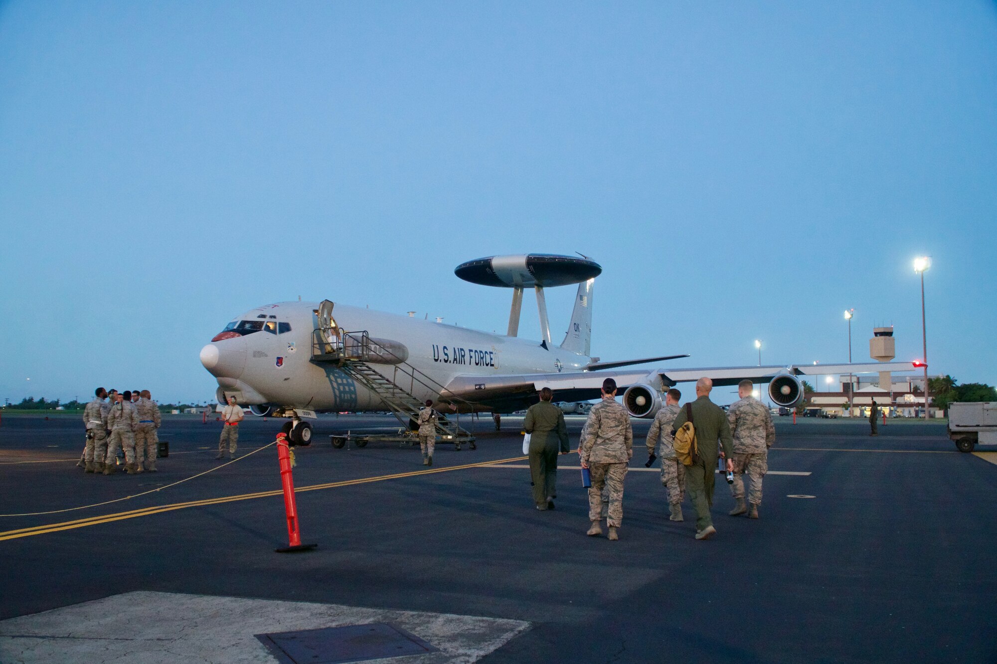 Crew members from the 513th Air Control Group board the Boeing E-3 Sentry aircraft at Joint Base Pearl Harbor-Hickam on Jan. 24. 2018 as part of Sentry Aloha exercises.