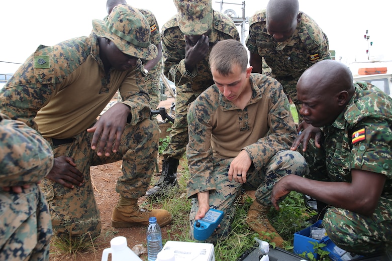 A U.S. Marine assigned to Special Purpose Marine Air-Ground Task Force-Crisis Response-Africa tests water alkalinity during a water purification exercise in Jinja, Uganda, Dec. 5, 2017. SPMAGTF-CR-AF is deployed to conduct limited crisis-response and theater-security operations in Europe and Africa.