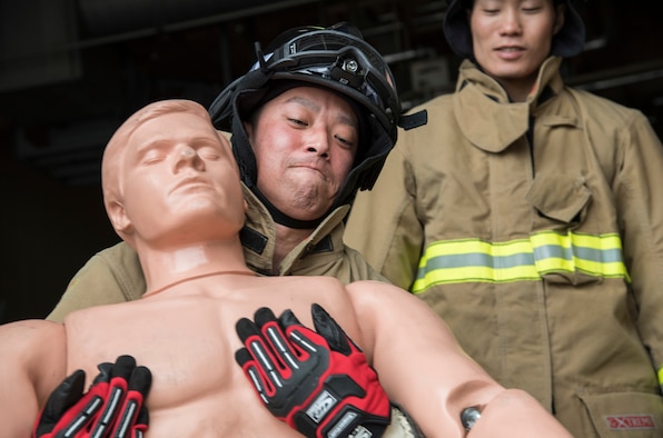 Japan Ground Self-Defense Force Sergeant Kenta Takahashi, a 1st Training Unit indirect fire infantryman, from Camp Higashi-Chitose, Hokkaido, Japan, carries a 180-pound mannequin during a JGSDF shadow program at Misawa Air Base, Japan, March 5, 2018,. The JGSDF uses programs like their basic English course to invest time in their members to learn the basics of English in order to enhance mission execution during future bilateral engagements. Not only did the JGSDF members practice their English, but they embedded with their U.S. Air Force counterparts, who taught them how to perform their day-to-day duties. (U.S. Air Force photo by Senior Airman Sadie Colbert)