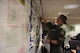 U.S. Air Force Capt. Kevin Brohaugh, 100th Operations Group assistant chief of scheduling, and Staff Sgt. Christopher Shelton, 100th Operations Group NCO-in-charge of scheduling, prepare crew schedules for a readiness exercise at RAF Mildenhall, England, Feb. 26, 2018.  The exercise tested the wing’s ability to rapidly mobilize an entire wing and prepare to launch KC-135s in response to an international incident. (U.S. Air Force photo by Airmen 1st Class Alexandria Lee)