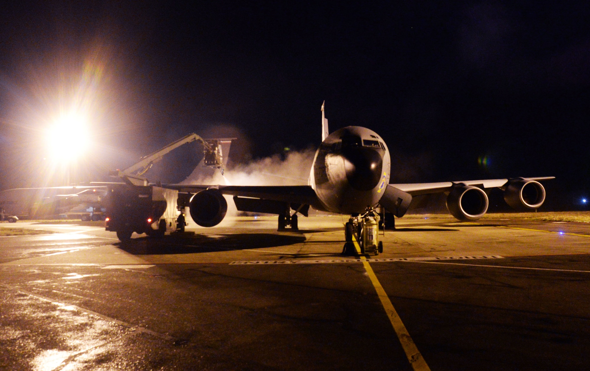 A U.S. Air Force KC–135 Stratotanker assigned to the 351st Air Refueling Squadron is de-iced during a readiness exercise at RAF Mildenhall, England, Feb. 26, 2018.  The exercise tested the wing’s ability to rapidly mobilize an entire wing and prepare to launch KC- 135 Stratotankers in response to an international incident. (U.S. Air Force photo by Airmen 1st Class Alexandria Lee)