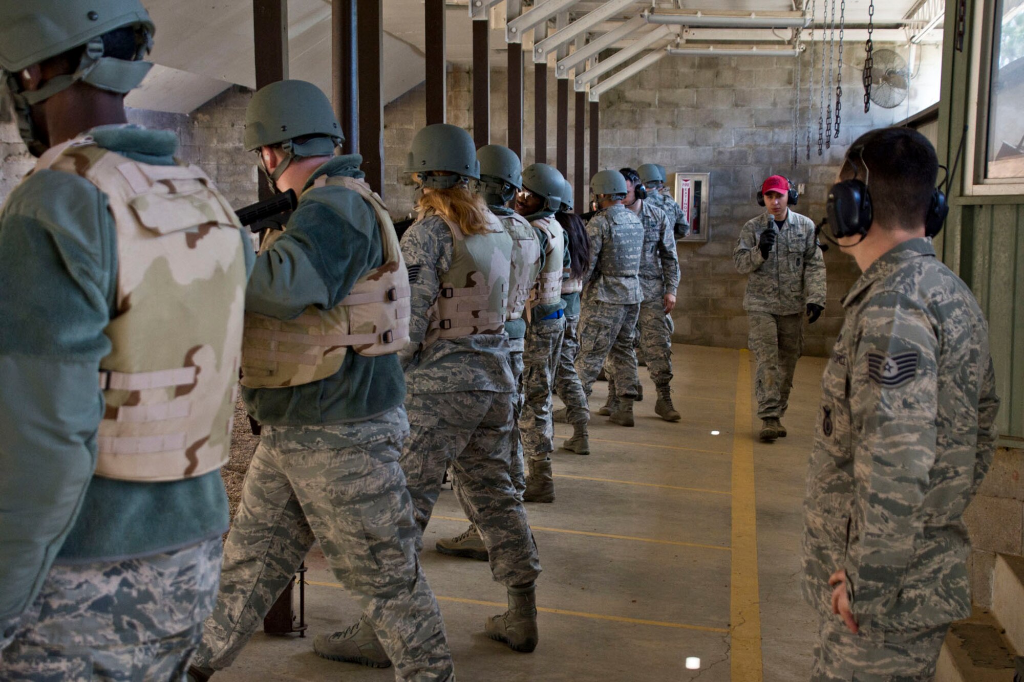 U.S. Air Force Senior Airman Ja Lee instructs Airmen from the 96th Aerial Port Squadron, when and when not to fire the M4 Carbine weapons training Feb. 10, 2018, at Little Rock Air Force Base. Ark.