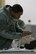 Staff Sgt. Joey Frisco, 445th Force Support Squadron services specialist, applies a nasopharyngeal airway flange on a practice model during self-aid and buddy care training here Feb. 11, 2018