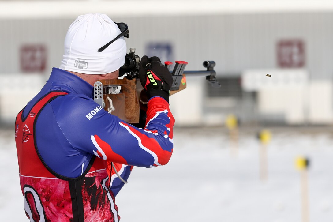 A soldier fires at targets during a biathlon event.