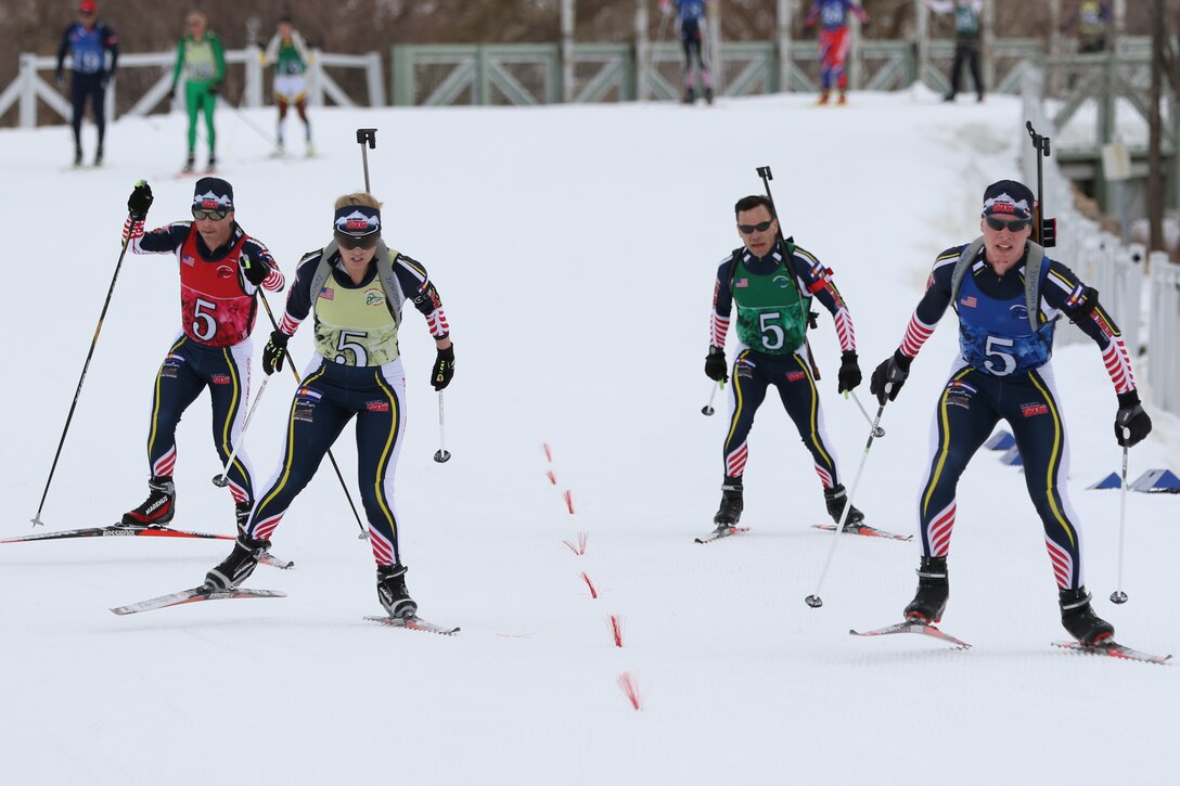The Colorado National Guard men’s biathlon team approaches the finish line.