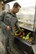 Airman Jarron Hannan, with the 72nd Dental Squadron, grabs an apple for an afternoon snack at the Vanwey Dining Facility. The Vanwey offers fresh fruits such as apples, oranges, bananas, kiwi and pineapple.