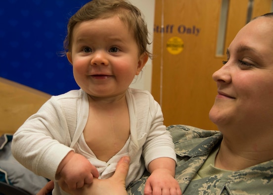 When the Rays' newborn baby needed life-saving surgery, the Air Force sent an aeromedical evacuation team to sustain and transport him across the ocean within a few hours. The Ray family is now finding ways to pay it forward and support other families.