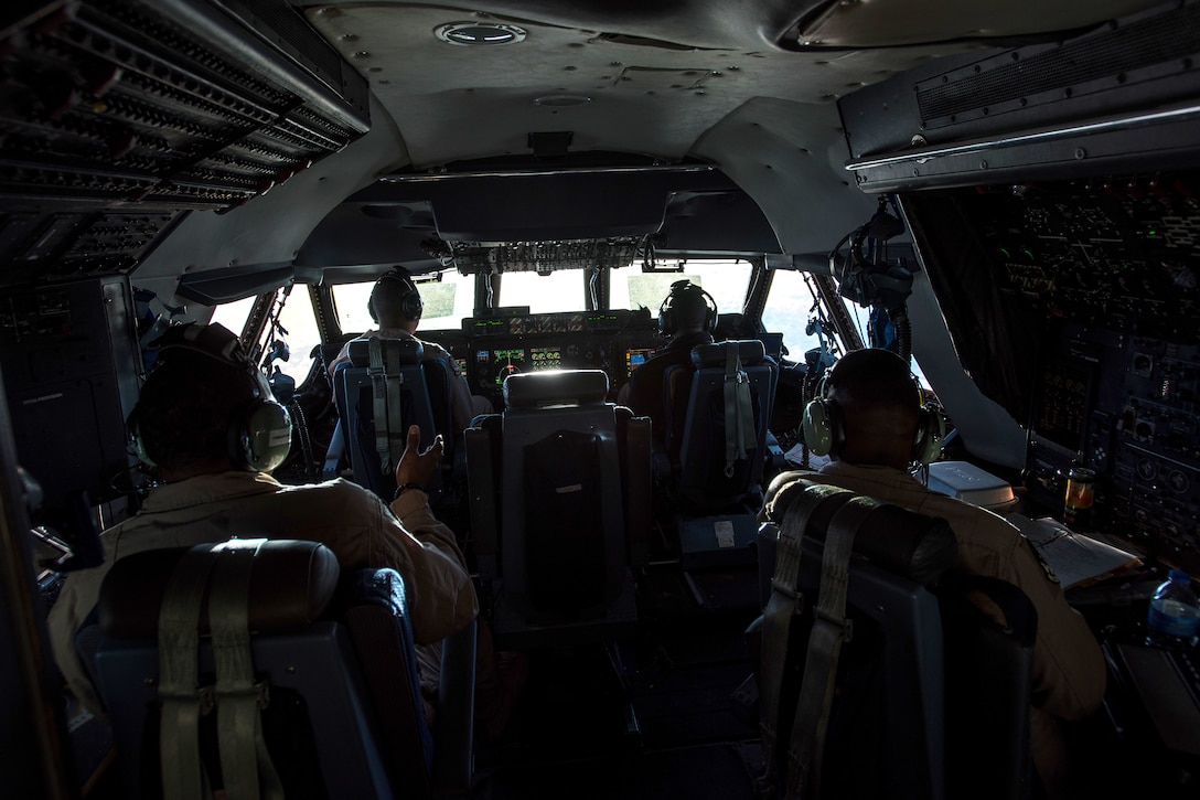 Air Force pilots fly in a C-5M Super Galaxy aircraft over Afghanistan.