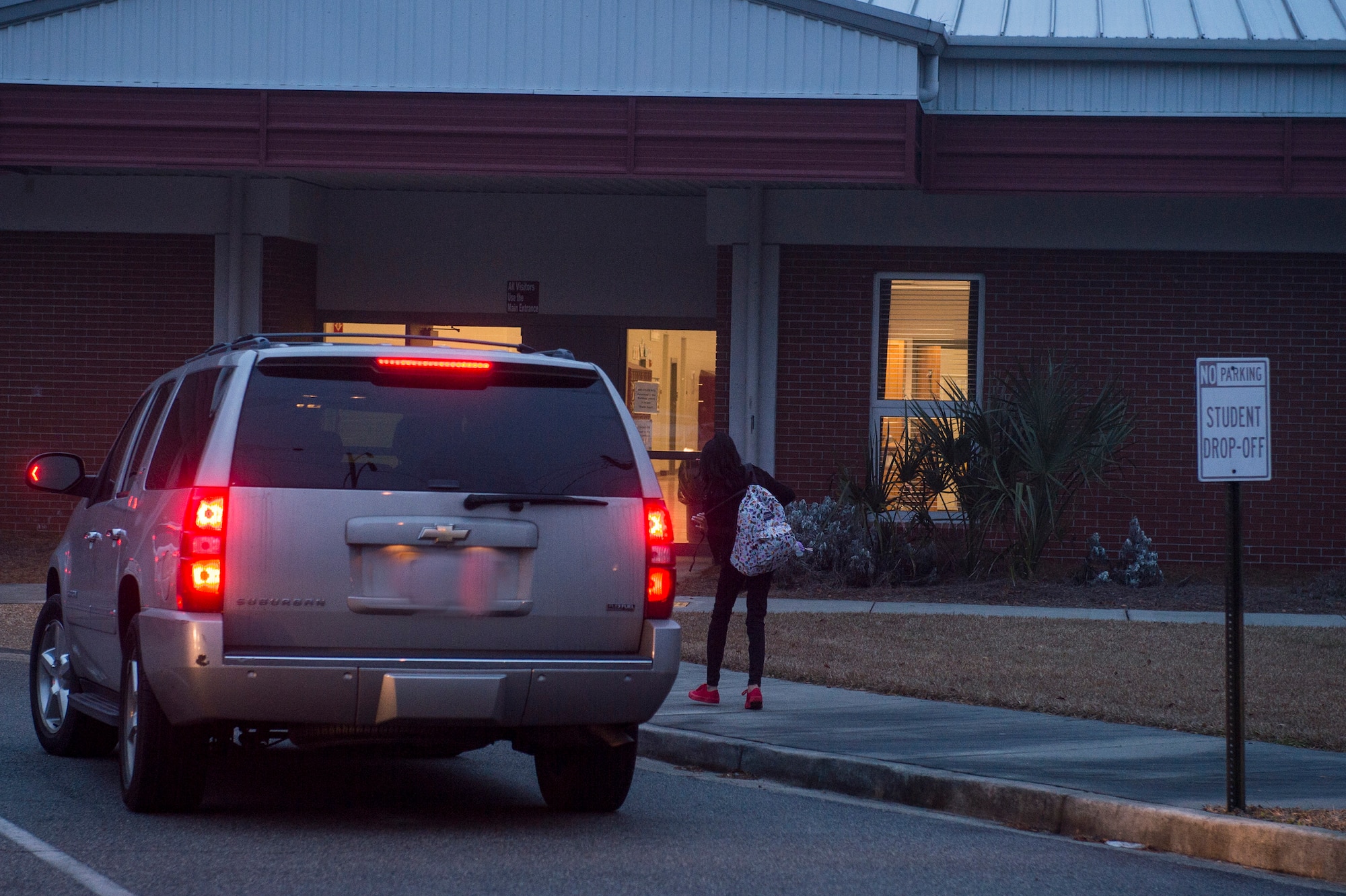 Zara, daughter of Tech. Sgt. Jean “Jay” Fleurantin, 723d Aircraft Maintenance Squadron electronic warfare technician, walks into school on her first day back Jan. 9, 2018, in Hahira, Ga. Zara was diagnosed with Acute Myeloid Leukemia in January 2017 and after numerous unsuccessful rounds of chemotherapy, Jay donated bone marrow as a last resort and in May 2017 the doctors announced Zara’s cancer was in full remission. (U.S. Air Force photo by Staff Sgt. Ceaira Tinsley)