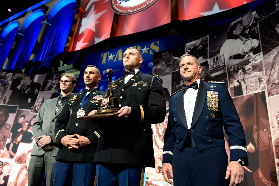 Chief of Staff of the Air Force Gen. David L. Goldfein accepts the Tragedy Assistance Program for Survivors Honor Guard Military Award on behalf of the Air Force’s 670,000 Airmen and their families during the 10th Annual TAPS Honor Guard Gala March 6, 2018, in Washington, D.C. The award recognized the Air Force’s enduring commitment to families of fallen. (U.S. Air Force photo by Staff Sgt. Rusty Frank)
