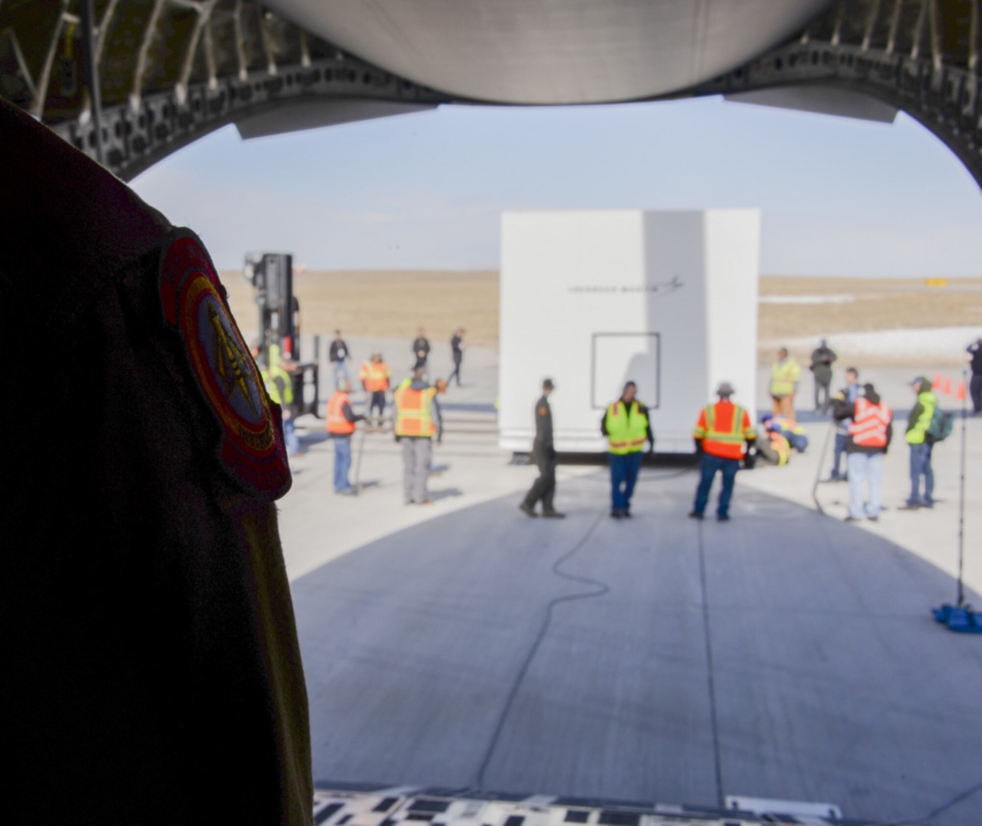 Airmen from the 21st Airlift Squadron and the 860th Aircraft Maintenance Squadron at Travis Air Force Base, California, load a NASA InSight Spacecraft onto a C-17 Globemaster III Feb. 28, 2018, at Lockheed Martin Space, Buckley Air Force Base, Colorado. The equipment was delivered to Vandenberg Air Force Base, Calif., where it will be the first planetary spacecraft to launch from the West Coast launch facility. The launch is scheduled to take place in May 2018 as part of the NASA Insight Mission to look beneath the Martian surface and study the planet’s interior. (U.S. Air Force photo by Senior Airman Amber Carter)