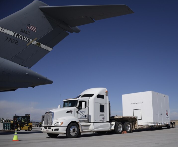 Airmen from the 21st Airlift Squadron and the 860th Aircraft Maintenance Squadron at Travis Air Force Base, California, load a NASA InSight Spacecraft onto a C-17 Globemaster III Feb. 28, 2018, at Lockheed Martin Space, Buckley Air Force Base, Colorado. The equipment was delivered to Vandenberg Air Force Base, Calif., where it will be the first planetary spacecraft to launch from the West Coast launch facility. The launch is scheduled to take place in May 2018 as part of the NASA Insight Mission to look beneath the Martian surface and study the planet’s interior. (U.S. Air Force photo by Senior Airman Amber Carter)