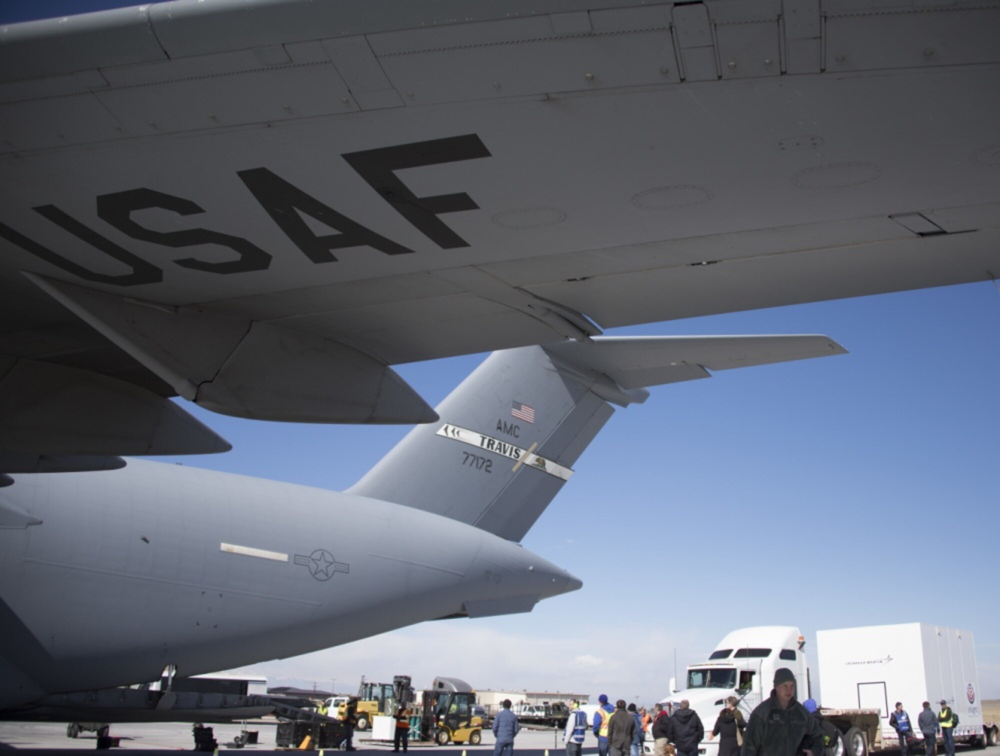 Airmen from the 21st Airlift Squadron and the 860th Aircraft Maintenance Squadron at Travis Air Force Base, California, load a NASA InSight Spacecraft onto a C-17 Globemaster III Feb. 28, 2018, at Lockheed Martin Space, Buckley Air Force Base, Colorado. The equipment was delivered to Vandenberg Air Force Base, Calif., where it will be the first planetary spacecraft to launch from the West Coast launch facility. The launch is scheduled to take place in May 2018 as part of the NASA Insight Mission to look beneath the Martian surface and study the planet’s interior. (U.S. Air Force photo by Senior Airman Amber Carter)