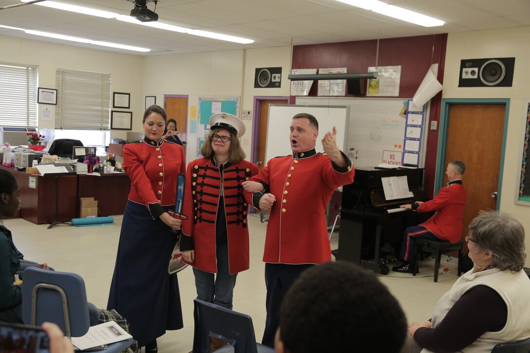 On March 7, 2018 vocalists from "The President's Own" U.S. Marine Band performed a Music in the High Schools program at Bowie High School in Bowie, Md. (U.S. Marine Corps photo by Master Sgt. Kristin duBois/released)