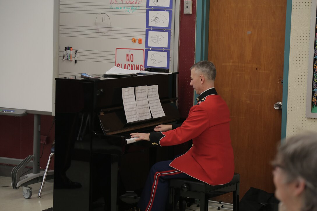 On March 7, 2018 vocalists from "The President's Own" U.S. Marine Band performed a Music in the High Schools program at Bowie High School in Bowie, Md. (U.S. Marine Corps photo by Master Sgt. Kristin duBois/released)