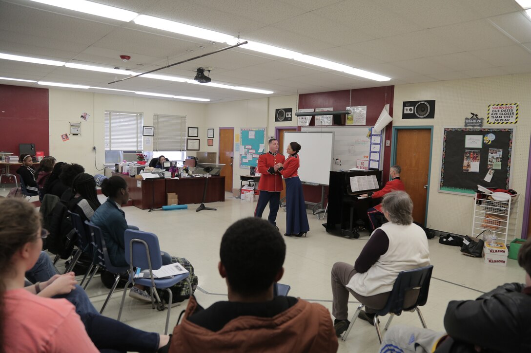 On March 7, 2018 vocalists from "The President's Own" U.S. Marine Band performed a Music in the High Schools program at Bowie High School in Bowie, Md. (U.S. Marine Corps photo by Master Sgt. Kristin duBois/released)