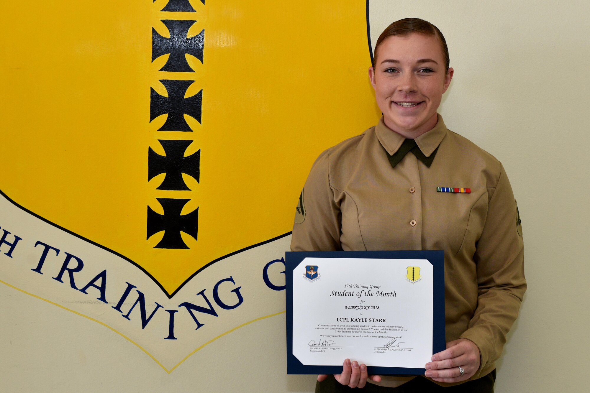 17th Training Group Student of the Month for Feb. 2018, U.S. Marine Corps Lance Cpl. Kayle Starr, Marine Corps Detachment at Goodfellow trainee, stands in Brandenburg Hall on Goodfellow Air Force Base, Texas, March 2, 2018. Starr is the Goodfellow Student of the Month spotlight for Feb. 2018, a series highlighting Goodfellow students.   (U.S. Air Force photo by Senior Airman Randall Moose/Released)