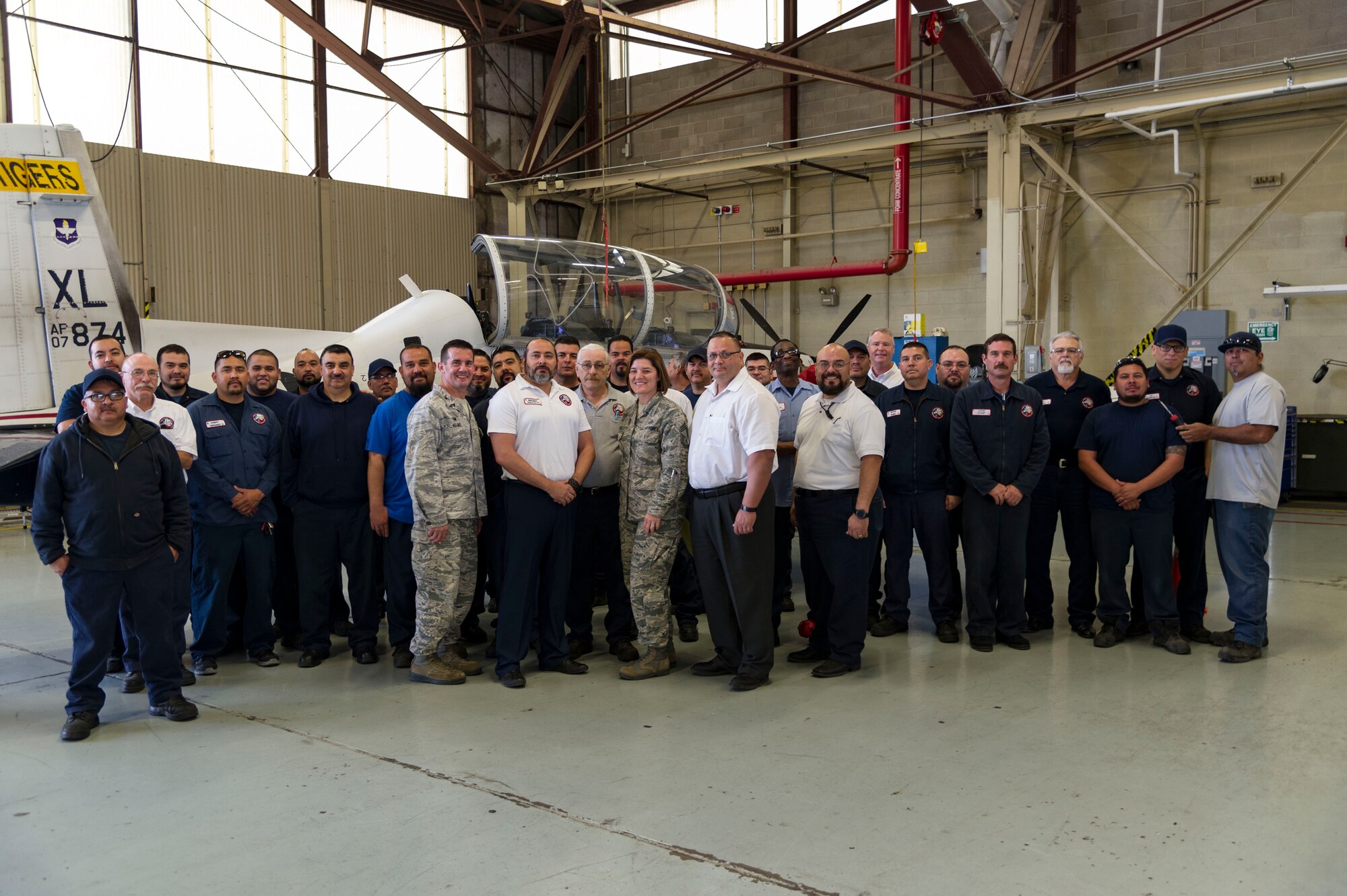 Benjamin Gonzalez IV, 47th Maintenance Directorate swing shift productions supervisor, was chosen by wing leadership to be the “XLer” of the week, for the week of Feb. 26, 2018, at Laughlin Air Force Base, Texas. The “XLer” award, presented by Col. Charlie Velino, 47th Flying Training Wing commander, is given to those who consistently make outstanding contributions to their unit and the Laughlin mission. (U.S. Air Force photo/Airman 1st Class Daniel Hambor)