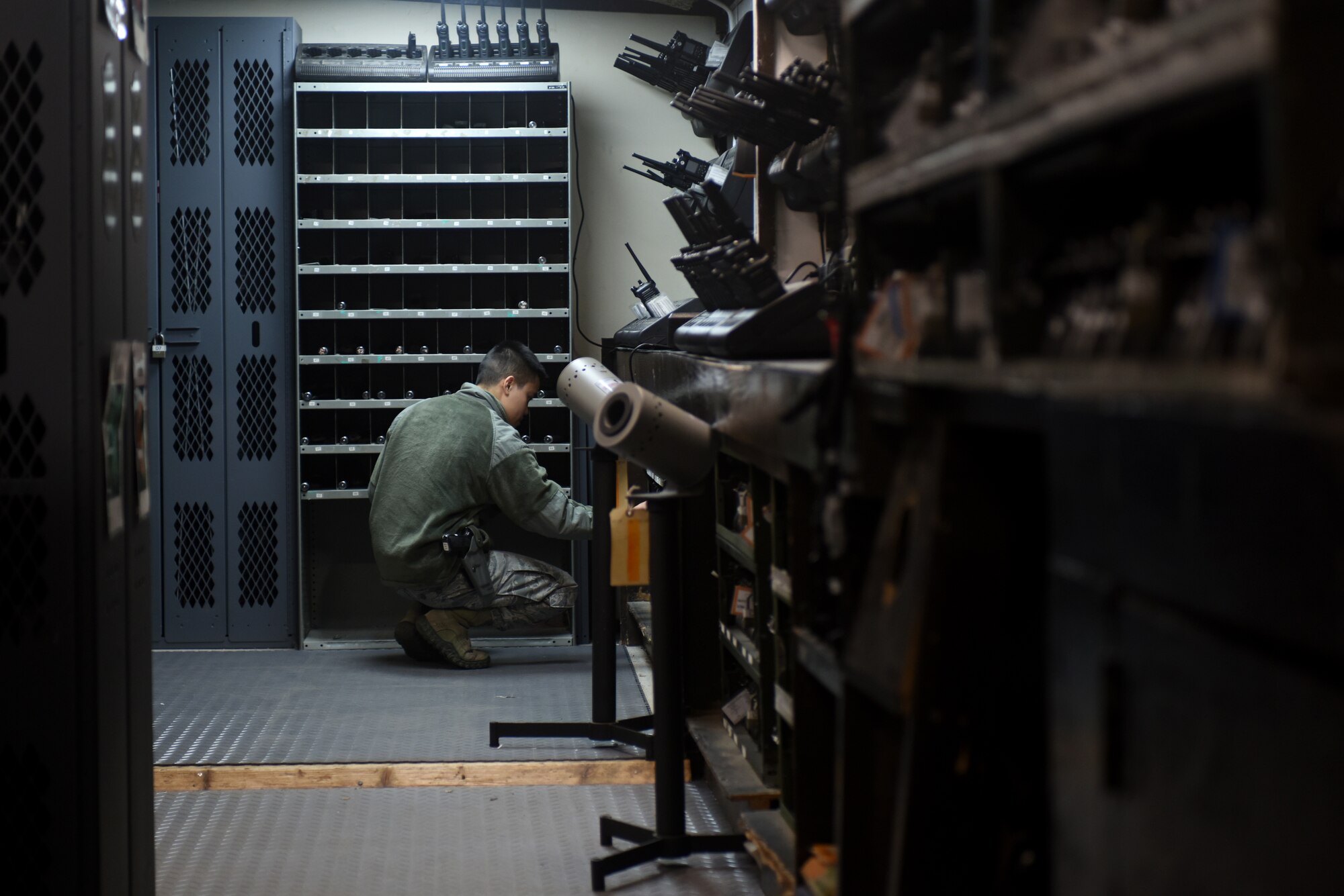 An Airman assigned to the 48th Security Forces Squadron’s armory returns gear to its labeled location at Royal Air Force Lakenheath, England, Feb. 20. Armory Airmen are responsible for all of the 48th SFS weapons. (U.S. Air Force photo/Airman 1st Class Eli Chevalier)