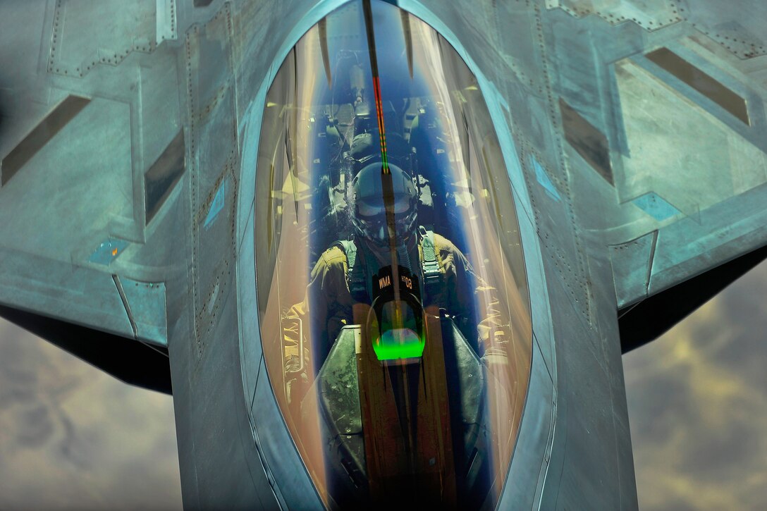 An Air Force F-22 prepares to receive fuel.