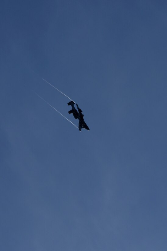 An A-10C Thunderbolt II aircraft flies over Warfield Air National Guard Base during the fini flight of Air Force Col. Paul Zurkowski, a pilot assigned to the 104th Fighter Squadron, March 3rd, 2018, at Middle River, Md.