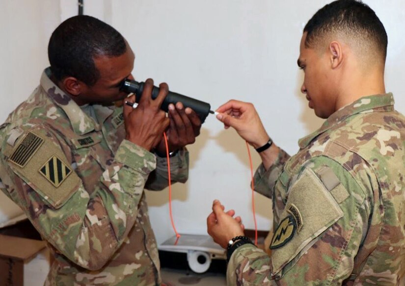 U.S. Army Soldiers conduct hands-on training during first fiber optics installers course.