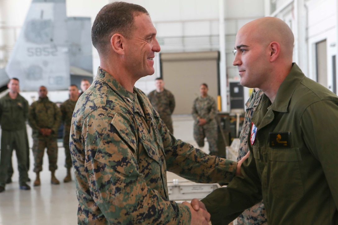 Col. Joseph Clearfield, the commanding officer of the 15th Marine Expeditionary Unit, gives recognition to Marines and Sailors of Marine Medium Tiltrotor Squadron 161 (Reinforced) for their outstanding dedication and hard work throughout the deployment, March 5, 2018. The 15th MEU is one of seven Marine Expeditionary Units currently in existence in the United States Marine Corps. The MEU's mission is to provide a rapid-response force capable of conducting conventional amphibious and maritime operations from sea, surface or air.