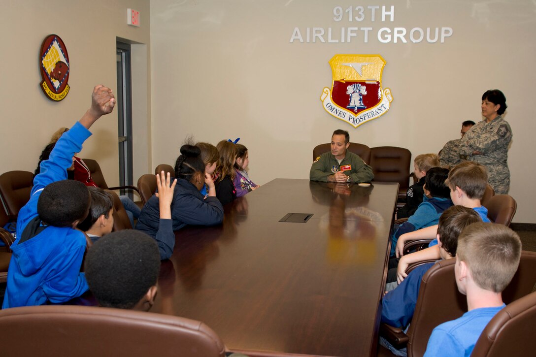 U.S. Air Force Reserve Col. Anthony Brusca, the 913th Airlift Group deputy commander, answers questions from a group of fourth graders from Southwest Christian Academy during their visit to Little Rock Air Force Base, Ark., Mar. 6, 2018.