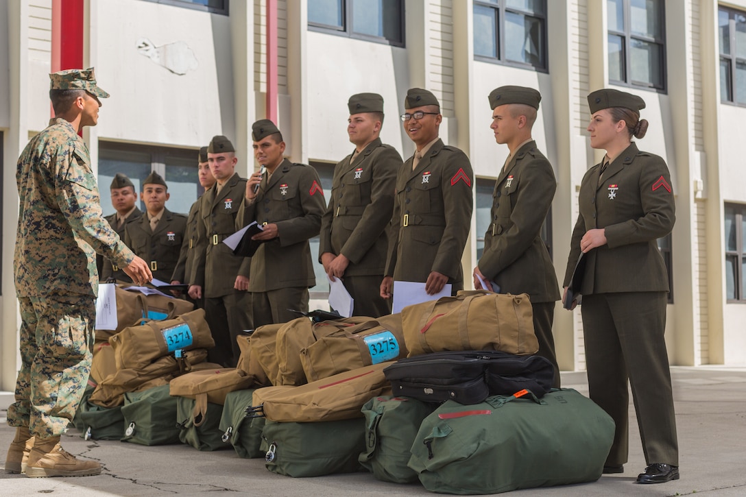 U.S. Marine Pfc. Kira Kozik, the first female Marine student to check in to the School of Infantry – West, stands in formation waiting for instruction on Camp Pendleton, Calif., March 6, 2018. This marks the first male-female integrated Marine Combat Training company on the West Coast.