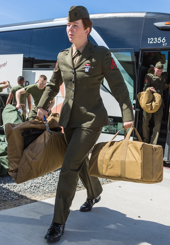 U.S. Marine Pfc. Savana Anderson steps off the bus to the School of Infantry - West on Camp Pendleton, Calif., March 6, 2018. This marks the first male-female integrated Marine Combat Training company on the West Coast.