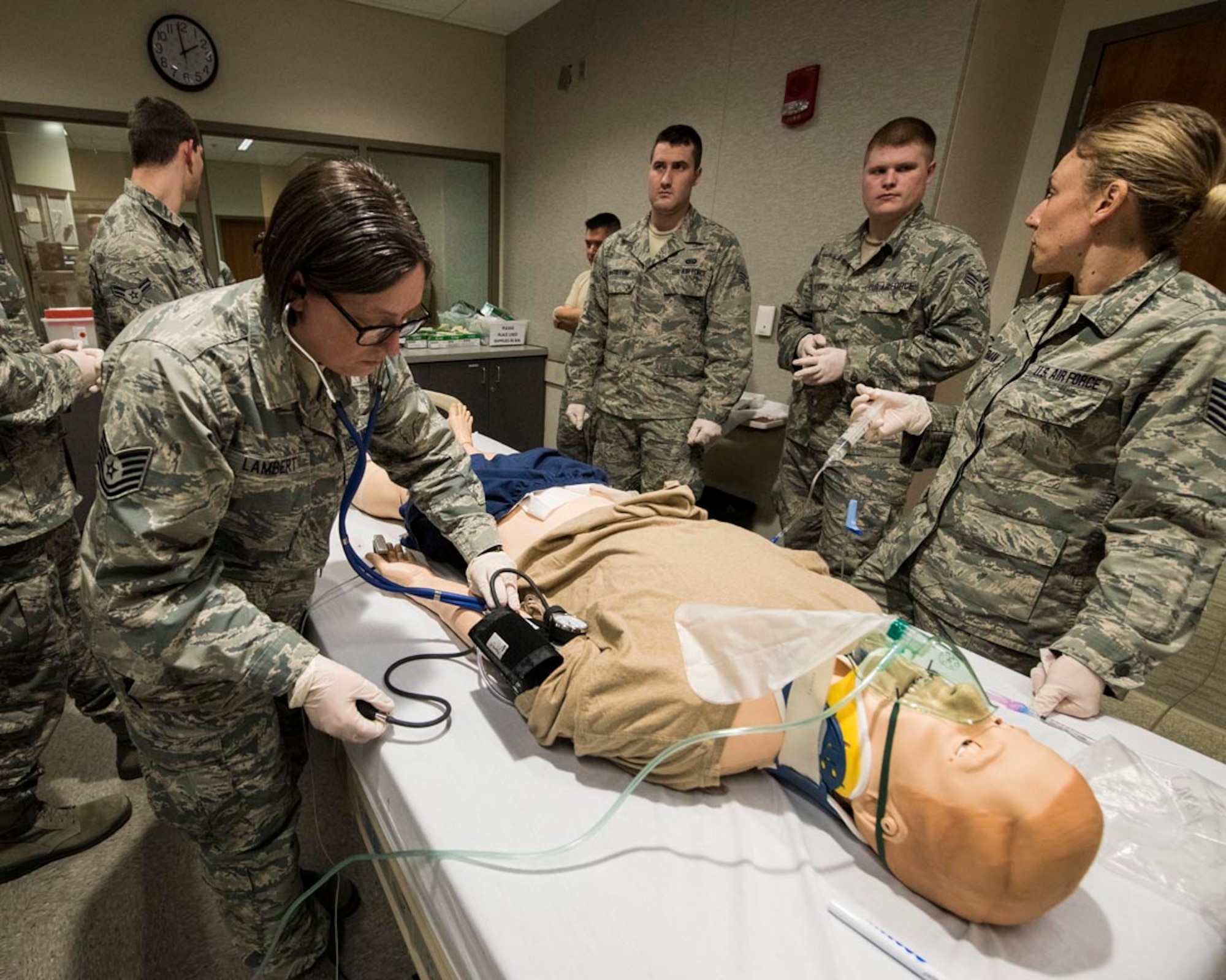 Tech. Sgt. Linda Lambert, an aerospace medical service technician at the 92nd Medical Group, checks vitals on a mannequin in a simulation lab March 4, 2018 at the Washington State University College of Nursing Riverpoint Campus in Spokane, Wash. More than 45 nurses, medics and medical providers from the 141st MDG as well as seven medical personnel assigned to the 92nd MDG teamed up for the combined training during March’s unit training assembly. (U.S. Air National Guard photo by Staff Sgt. Rose M. Lust)