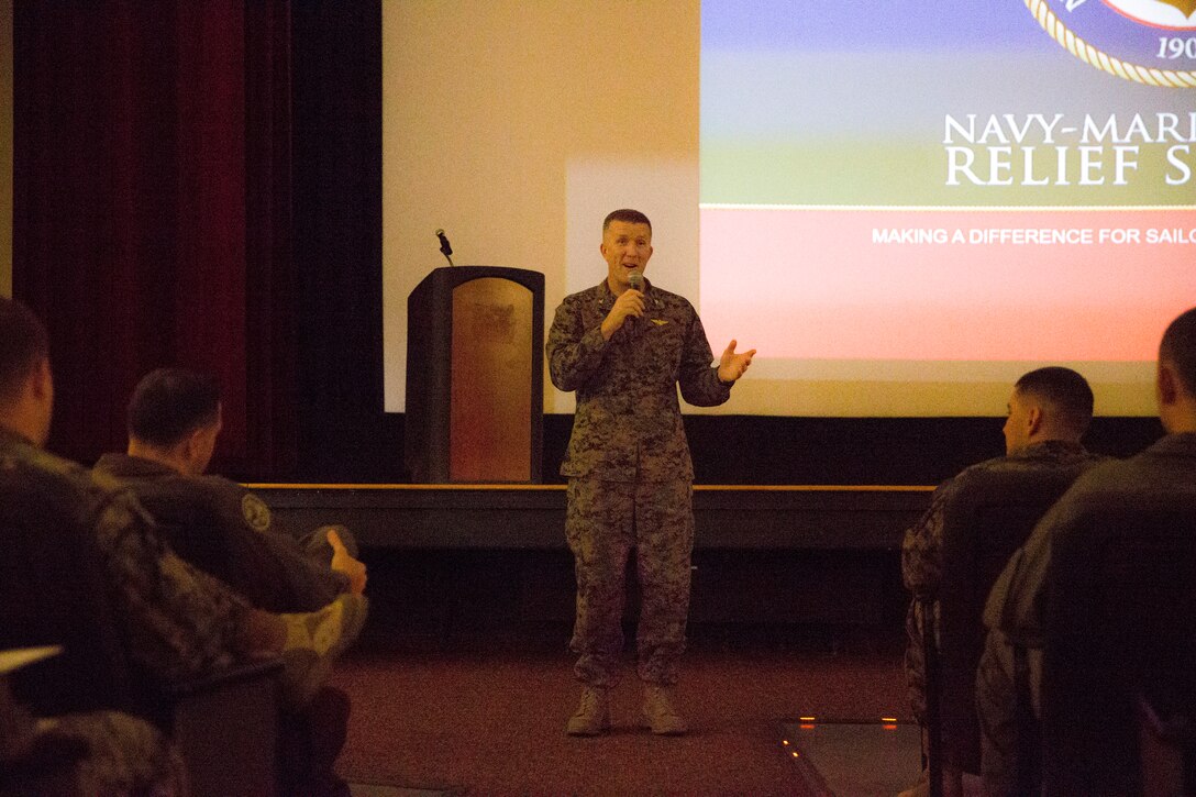 Commanding officer of Marine Corps Air Station (MCAS) Miramar, Col. Jason. G. Woodworth speaks with Marines and Sailors about Navy-Marine Corps Relief Society (NMCRS) fundraising efforts at MCAS Miramar, Calif., March 7. NMCRS is a non-profit organization that supports active duty and retired Navy and Marine Corps service members and their families when they experience financial difficulty due to deployments, family emergencies and other hardships of military life. (U.S. Marine Corps photo by Lance Cpl. Mark A. Lowe II/Released)