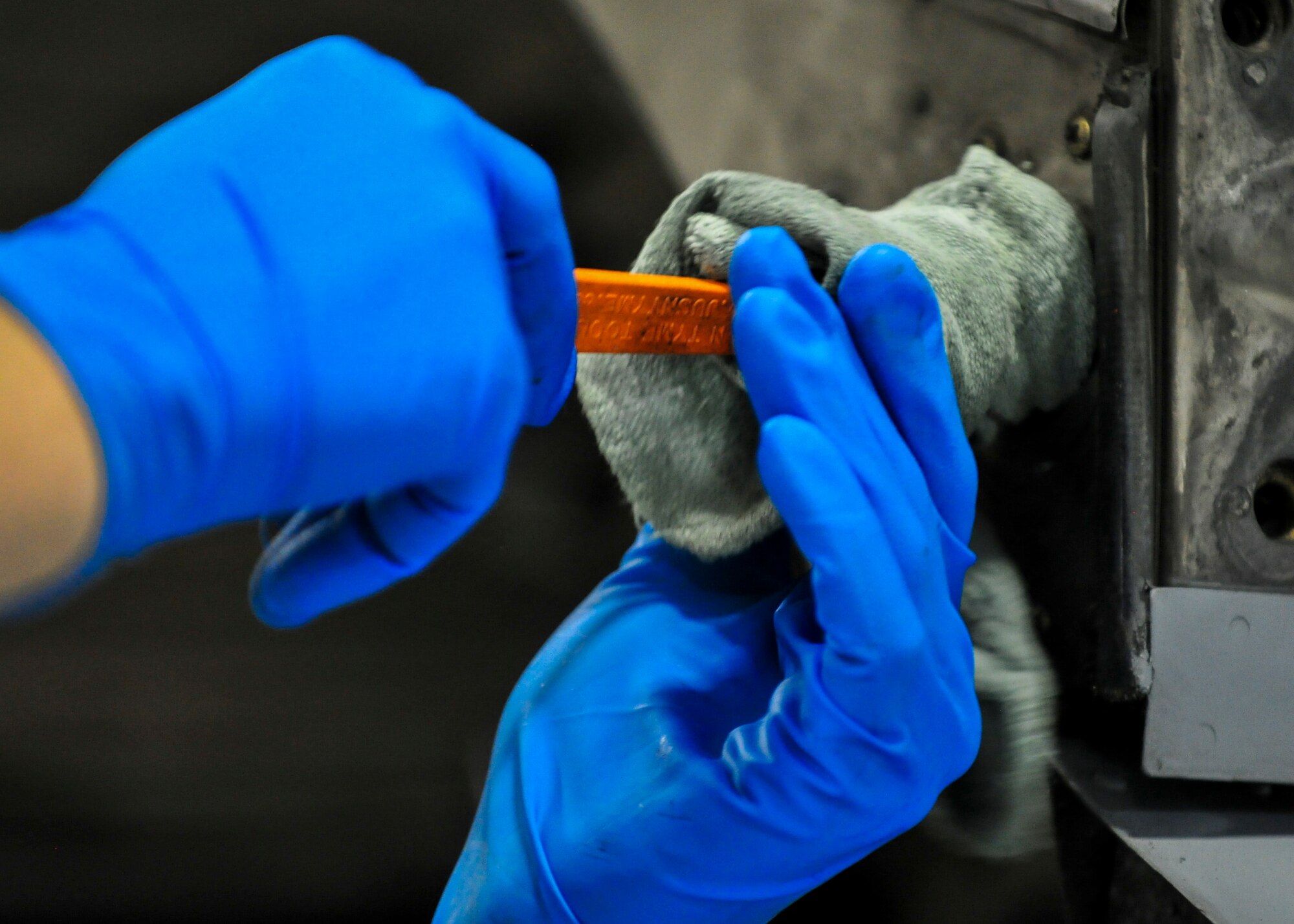 Senior Airman Daniel Phillis, an aerospace propulsion helper from the 910th Aircraft Maintenance Squadron here, cleans an engine mounting point on a C-130H Hercules aircraft here, March 7, 2018.