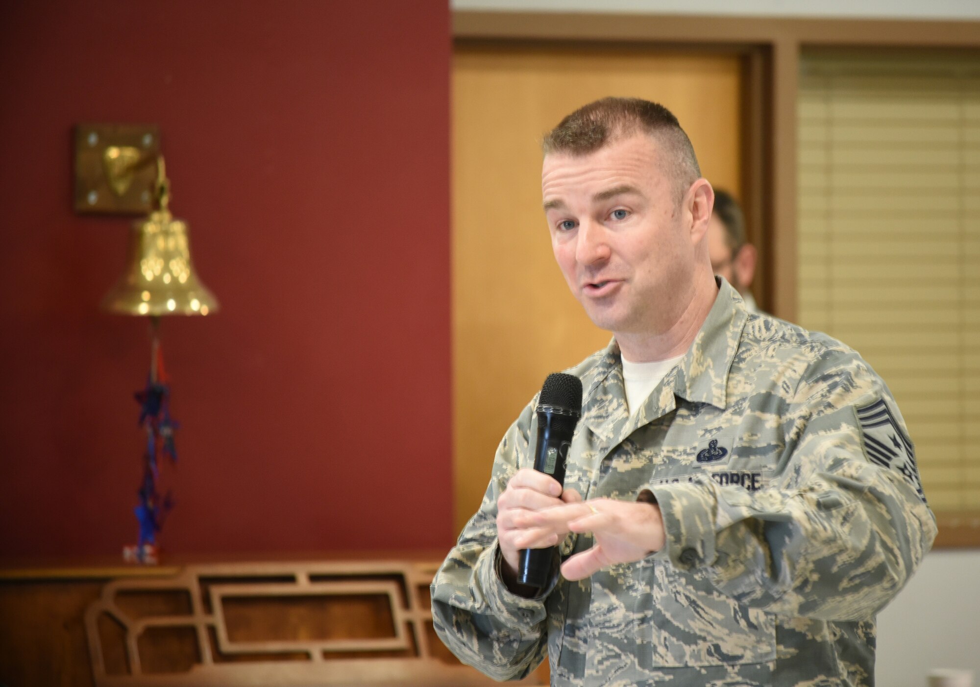 Chief Master Sgt. Gary Sharp, Air Force Sustainment Center command chief, poses a question to the Norman Veterans Center military panel during a Feb. 28, 2018, visit to the center in Norman, Oklahoma. The 15-member panel frequently visits area schools to share their military experiences and life lessons with students.