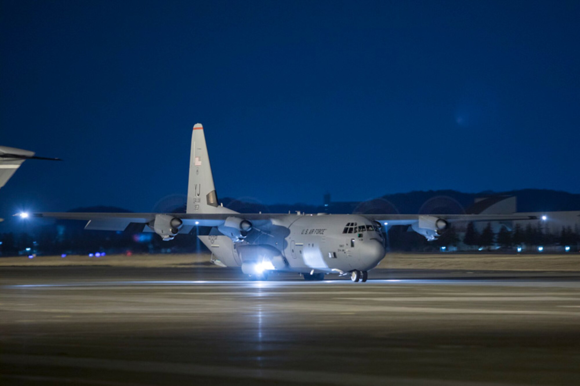 A C-130J Super Hercules taxis down