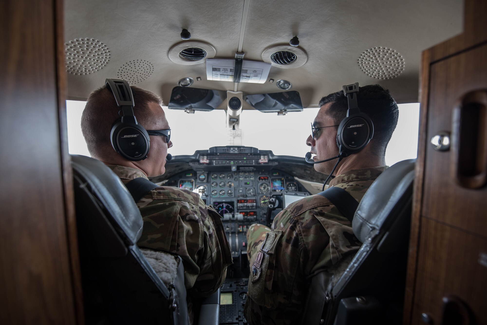 U.S. Air Force 1st Lt. Riley Snowden, a pilot assigned to the 746th Expeditionary Airlift Squadron, performs pre-flight tasks in the flight deck of a C-21 at Al Udeid Air Base, Qatar, Feb. 7, 2018. The C-21 is primarily used to deliver members of leadership most commonly consisting of general officer or their civilian counterparts, quickly and efficiently to bases across the U.S. Central Command’s area of responsibility. (U.S. Air National Guard photo by Master Sgt. Phil Speck)