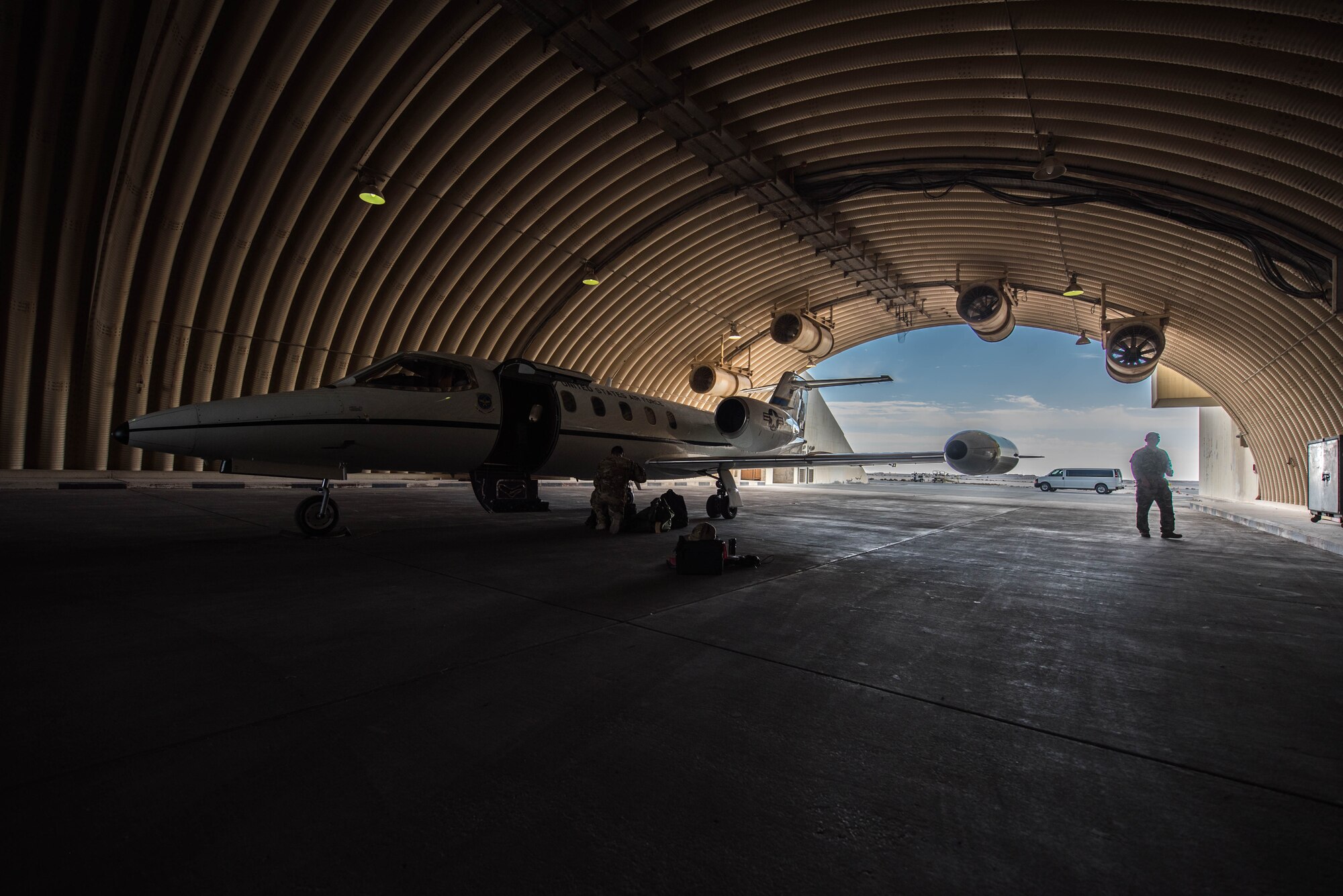 U.S. Air Force 1st Lt. Riley Snowden, a pilot assigned to the 746th Expeditionary Airlift Squadron, performs pre-flight tasks in the flight deck of a C-21 at Al Udeid Air Base, Qatar, Feb. 7, 2018. The C-21 is primarily used to deliver members of leadership most commonly consisting of general officer or their civilian counterparts, quickly and efficiently to bases across the U.S. Central Command’s area of responsibility. (U.S. Air National Guard photo by Master Sgt. Phil Speck)